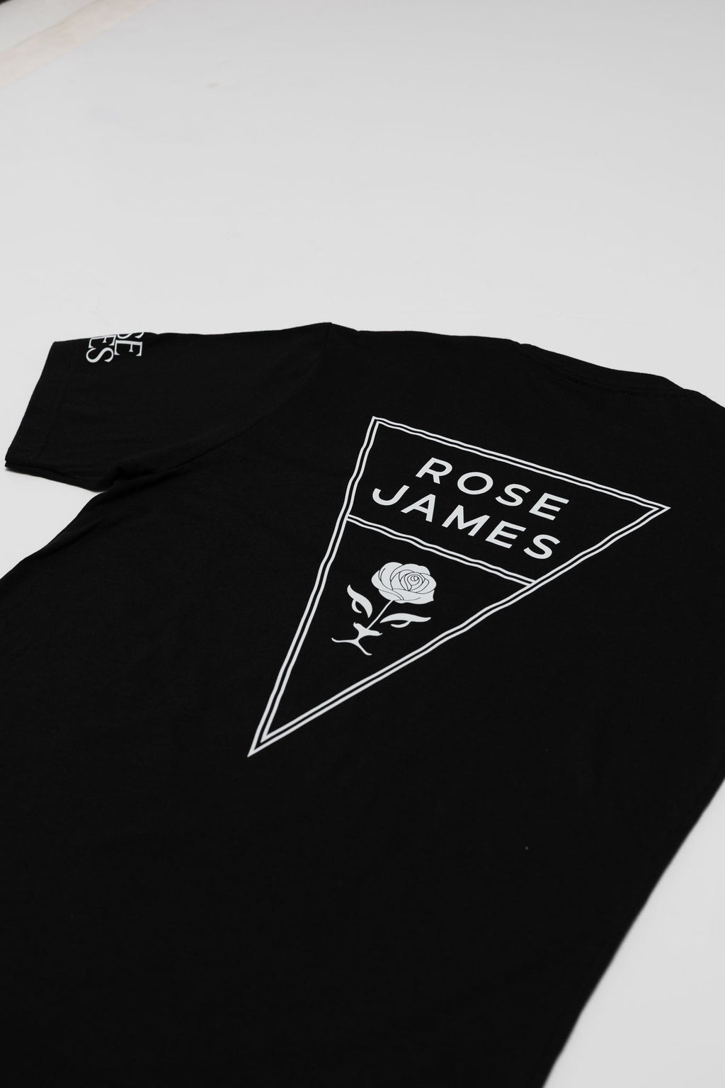 Black t-shirt with 'Rose James' logo on a white background
